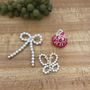 #1076 Christmas beaded bow and red bell ornaments  3.25 in X 2.5 in